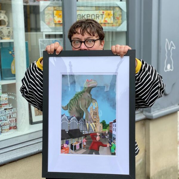 A3 framed print of a dinosaur attack on Stockport market