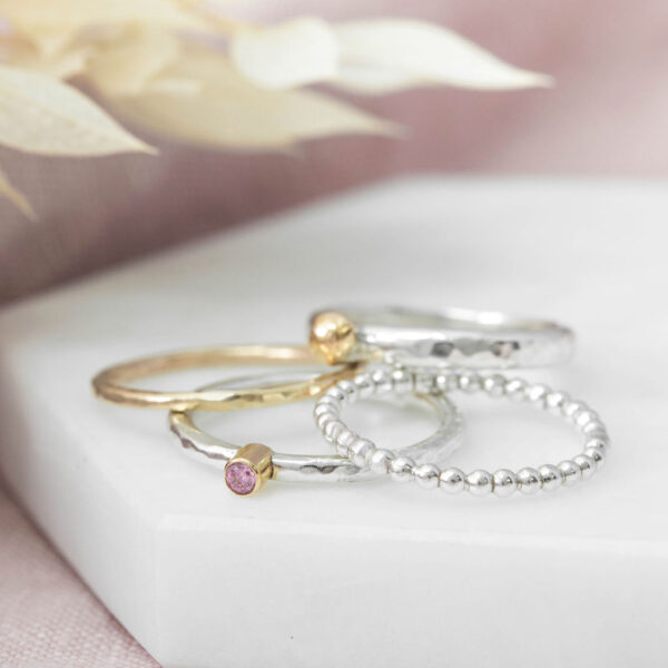 Susie Bond Jewellery, an array of stacking rings in sterling silver and gold