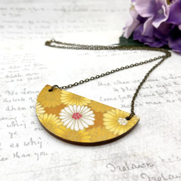 Yellow Japanese daisies statement necklace angle by Bowerbird Jewellery