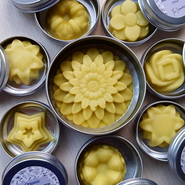 Solid lotions shaped in flowers