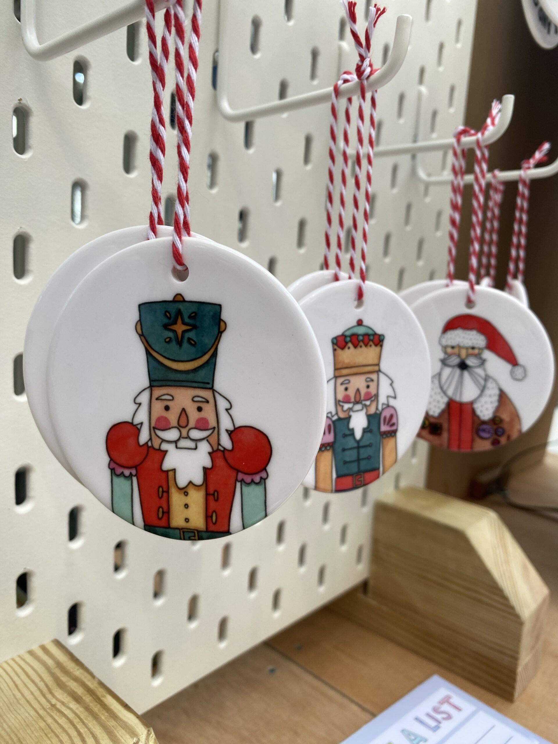 3 round ceramic Christmas decorations by Nova & Me - How to Create an on Brand Christmas Stall