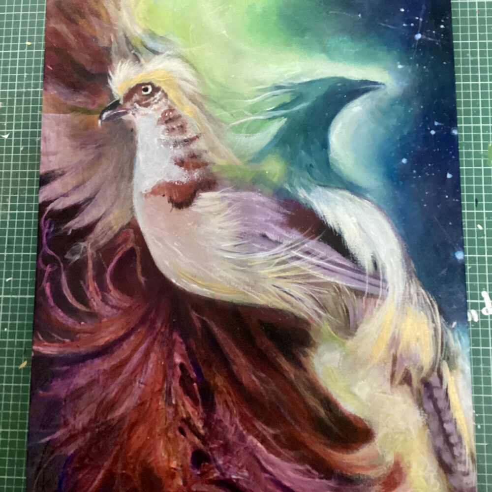 Mix Media Painting of Phoenix on a starry background and imposed over a Golden Pheasant. Nightshade Arte