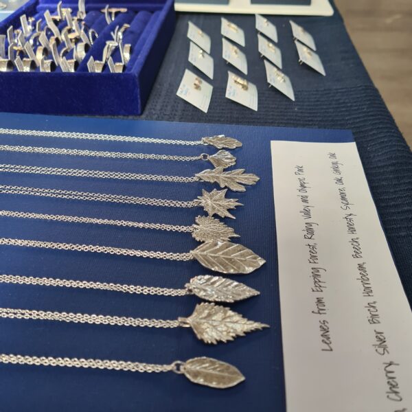 silver handmade jewellery nicely placed at a craft fair