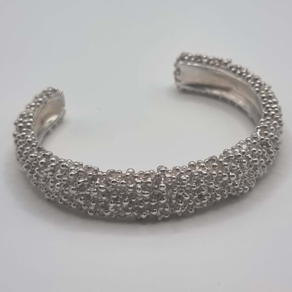 Erinna Jewellery Aphrodite Sea Foam Sterling Silver Granulation Bangle featuring all over, small granulation to create a natural effect that imitates naturally forming sea foam