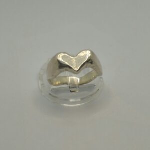 A hand carved chunky heart ring with wace texture, cast in sterling silver.