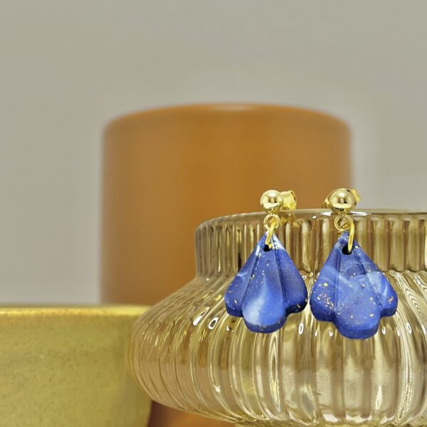 Dark blue marble clay earrings in a shell shape with gold sparkles, July Studio Creations