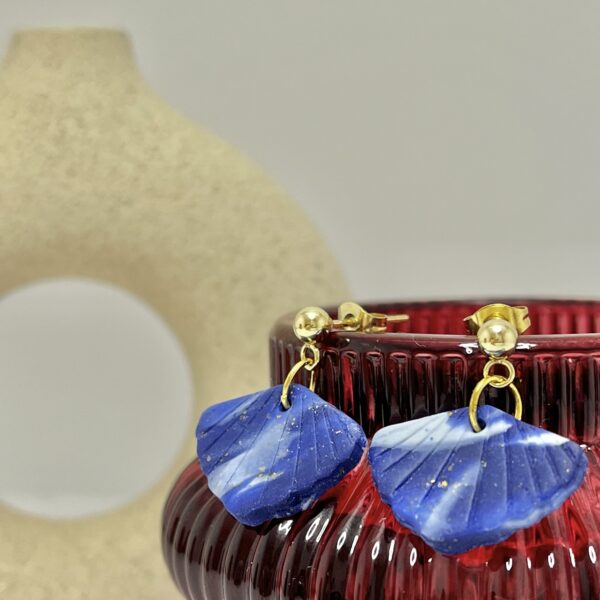 Dark blue marble clay earrings in a shell shape with gold sparkles and ball stud findings, July Studio Creations