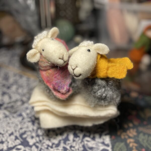 2 Herdwick sheep wearing scarves by wool artist the biscuit tin handmade