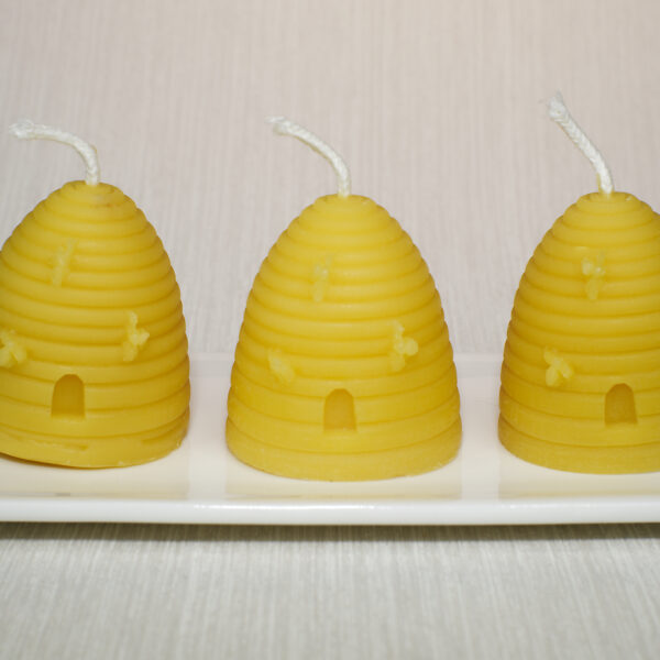 hand poured beeswax candles, shaped as traditional skep hive by mamas beeswax