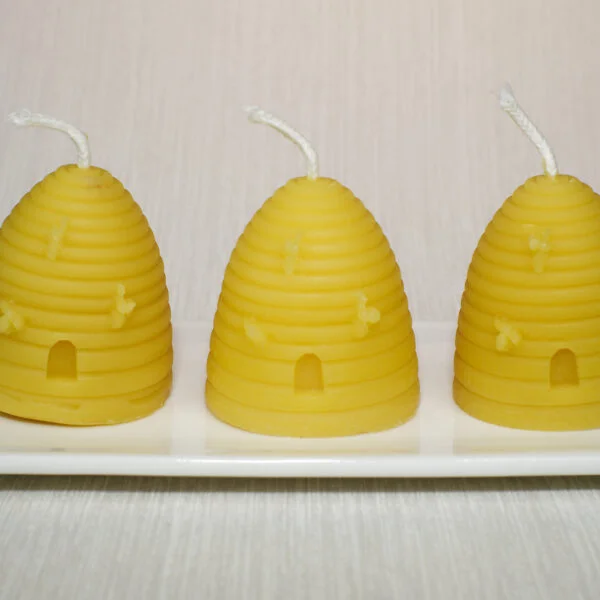 hand poured beeswax candles, shaped as traditional skep hive by mamas beeswax