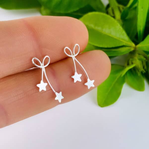 Sterling silver bow and star earrings