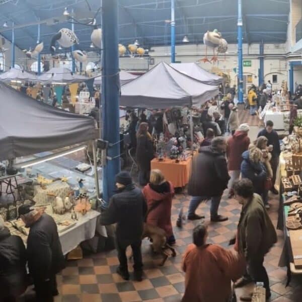 Image shows a market hall full of makers stands