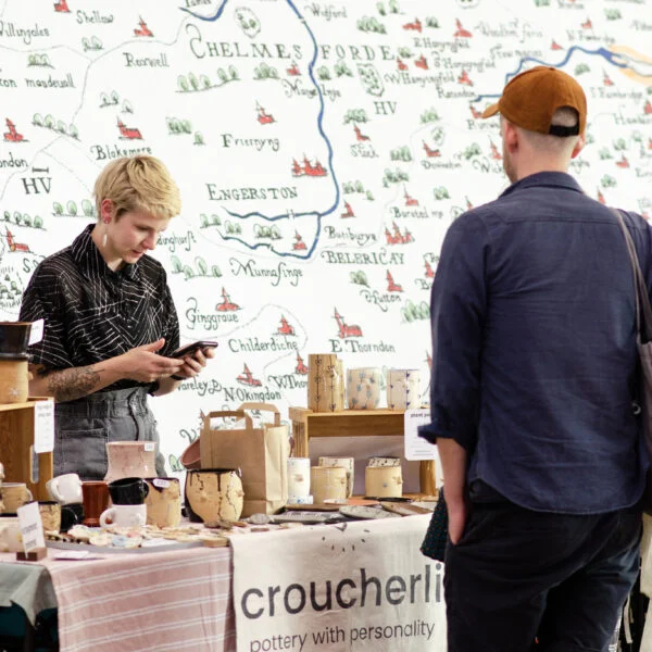 FOLK & BESPOKE stallholders at a market - market stall