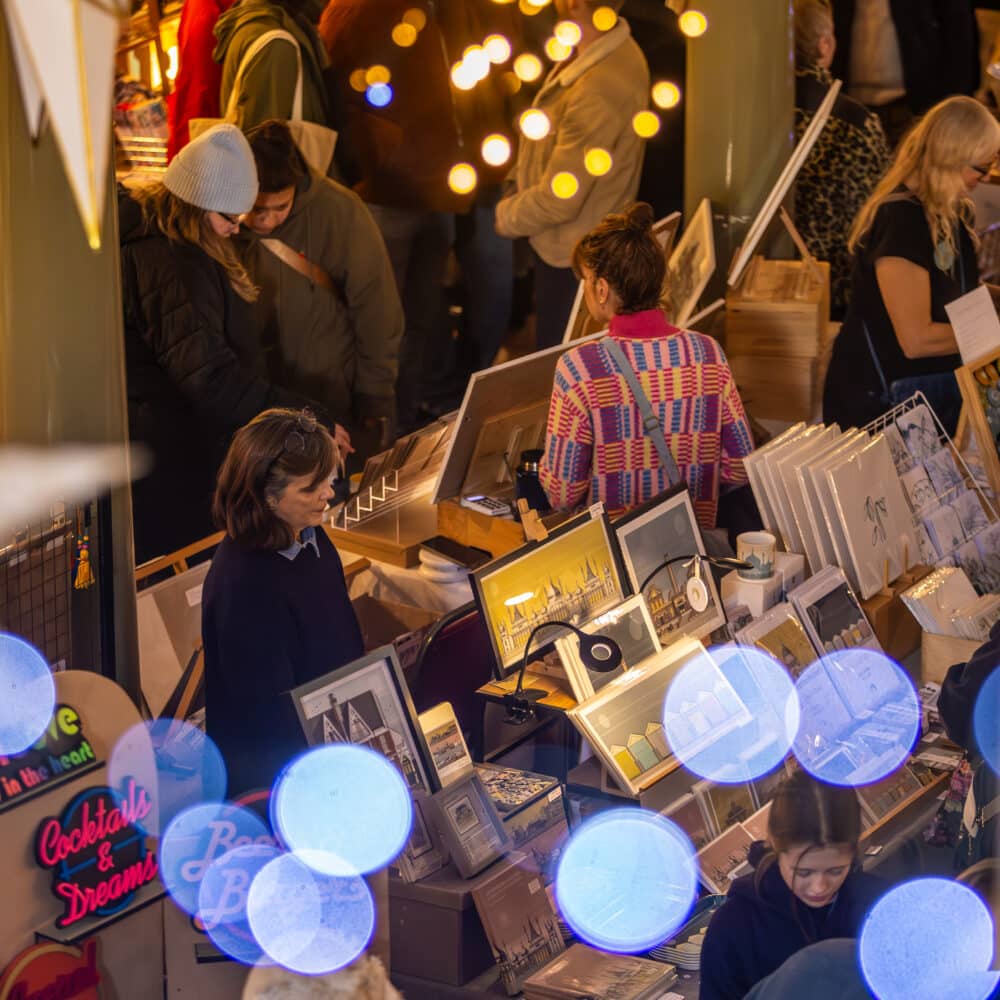 A picture of a stall from the Winter Makers Fair with decorative fairy lights.