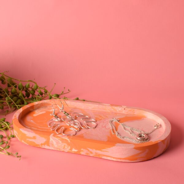 Pink and Orange oval trinket tray holding handmade silver wire earrings and a necklace - Ilex Studios Co. / Ilex Home