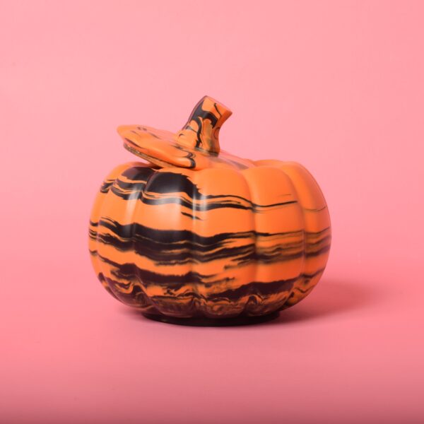A black and orange pumpkin-shaped pot with a lid - Ilex Studios Co. / Ilex Home