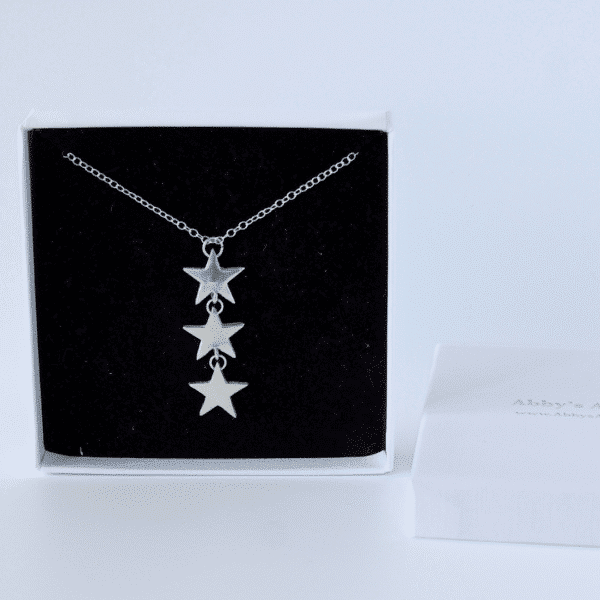 Fine Silver Star Necklace. 3 fine silver star necklace with sterling silver chain.