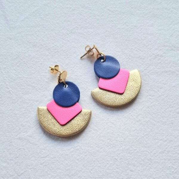 gold semi circle earrings with pink diamond shapes and blue circles