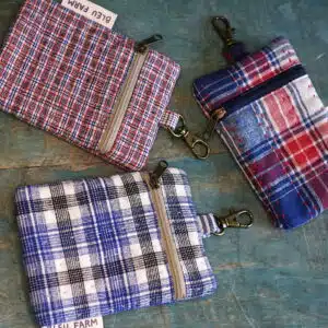 3 fabric pouches made from vintage fabric with key ring at the top