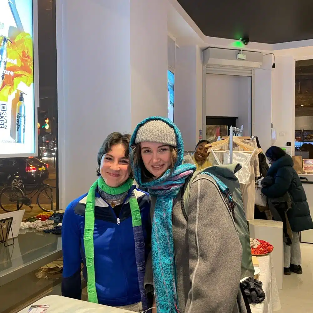 Visitors smiling at a past sustainable market at The Eco Fairs