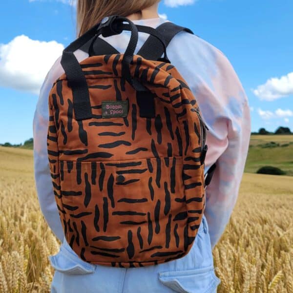 Bobbin and Spool, Sustainably handmade zebra oilskin mini rucksack