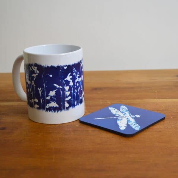 Emily Arnold Fine Art Cyanotype Artwork Dragonfly Coaster and ceramic mug with meadow flower pattern