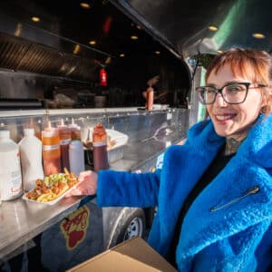 Customer enjoying No Frickin Chicken at Vegan Market by Vegan Fairs