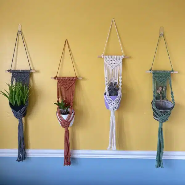 Sophie Spiral Macrame plant hangers in Navy, Rust, Ecru and Forest green.