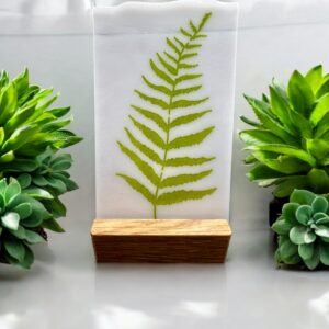 White glass tile with green fern design
