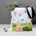 Showing the filled Gorgeous Bristol Tote Bag by dona B drawings featuring Clifton Suspension Bridge & Balloons