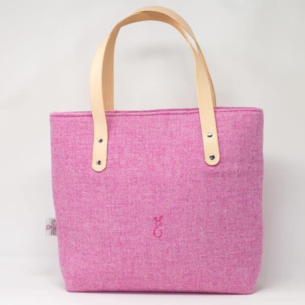 Pink Harris Tweed® cloth tote bag with natural veg tan leather handles, artisan made in the Rhondda Valleys by Emma Easter Handcrafted.