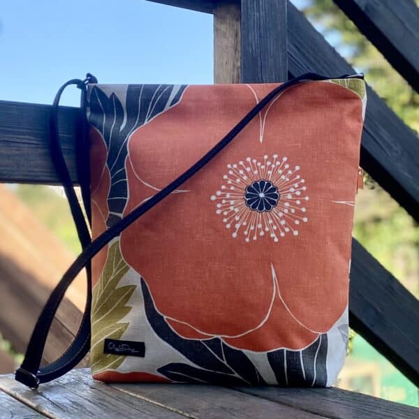 Cloggles Design Crossbody Bag made from discontinued fabric. 35cm x 35cm x 10cm with faux suede strap. Large Orange Poppy Flower fabric.