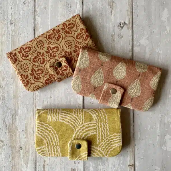 ClogglesDesign Wallets made from discontinued fabric samples.