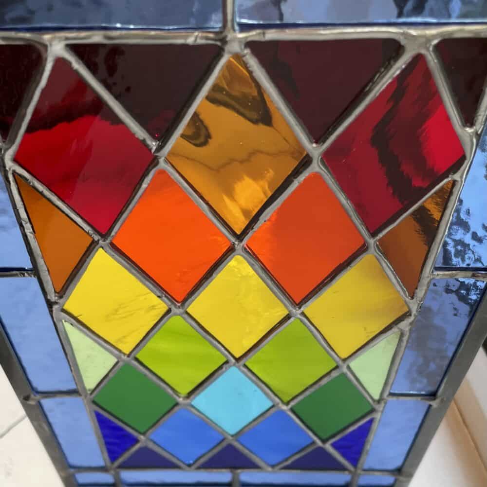 Tad Glass harlequin panel framed in zinc. A labour of love!