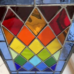 Tad Glass harlequin panel framed in zinc. A labour of love!