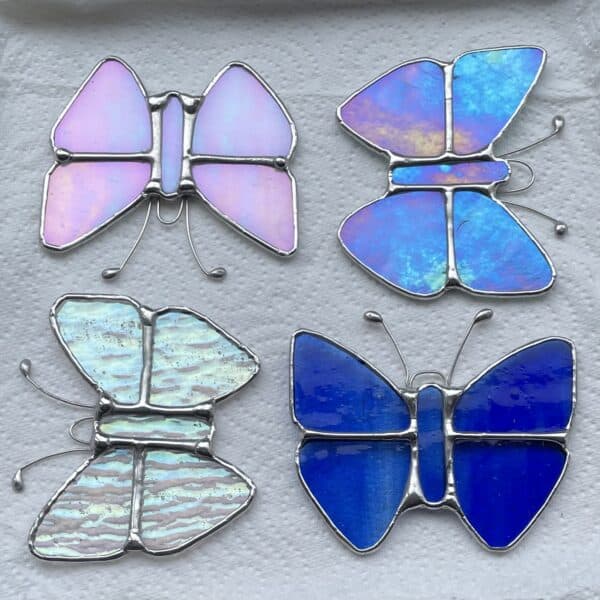 4 stained glass butterflies arranged in a square, by Tad Glass