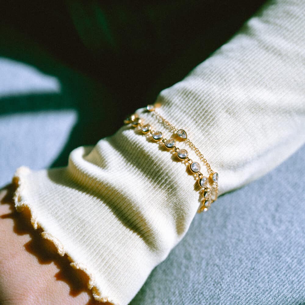 Gold tennis bracelet arm candy stack