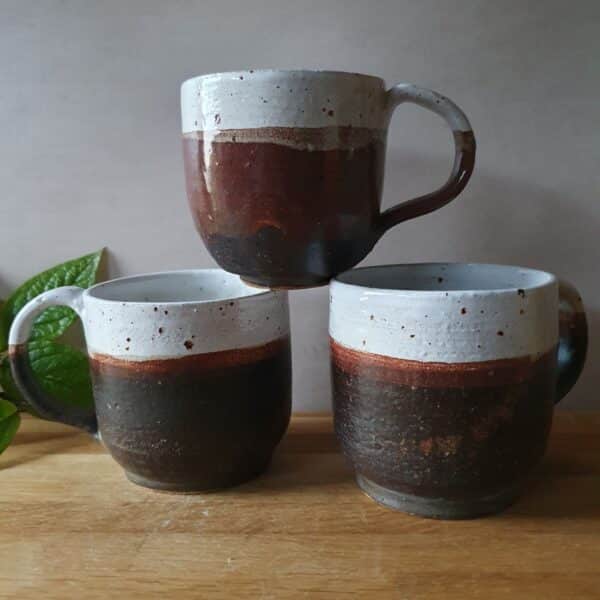 Brown and white rustic hand thrown speckled cups by Dawson Pottery on Pedddle cups