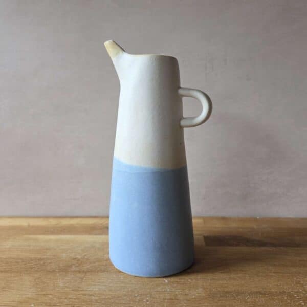 white and blue tall slim jug
