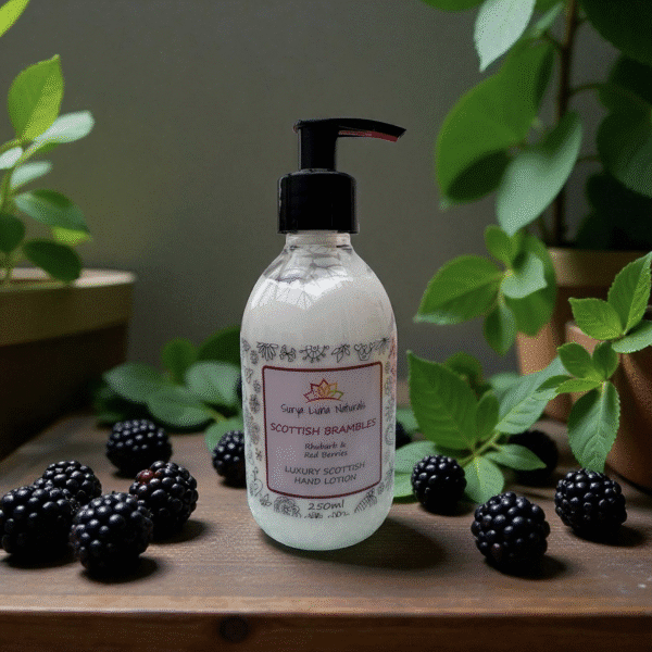 A bottle of hand lotion surrounded by leaves and berries