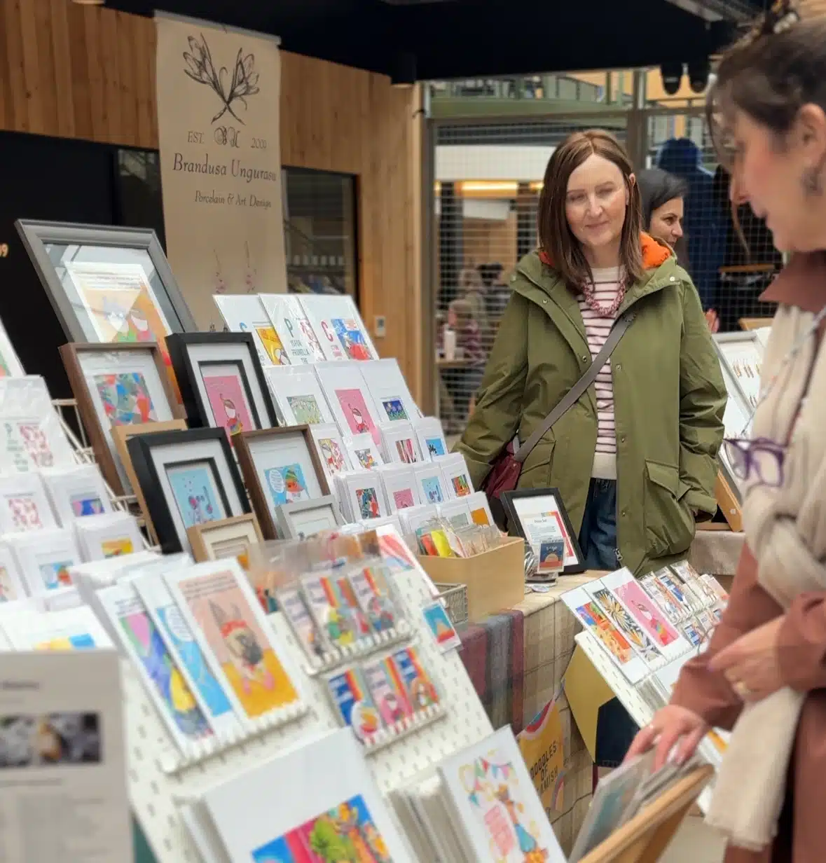Read our blog post about how, as a small business owner, do you fill your funnel? Image - Stallholder at a market.