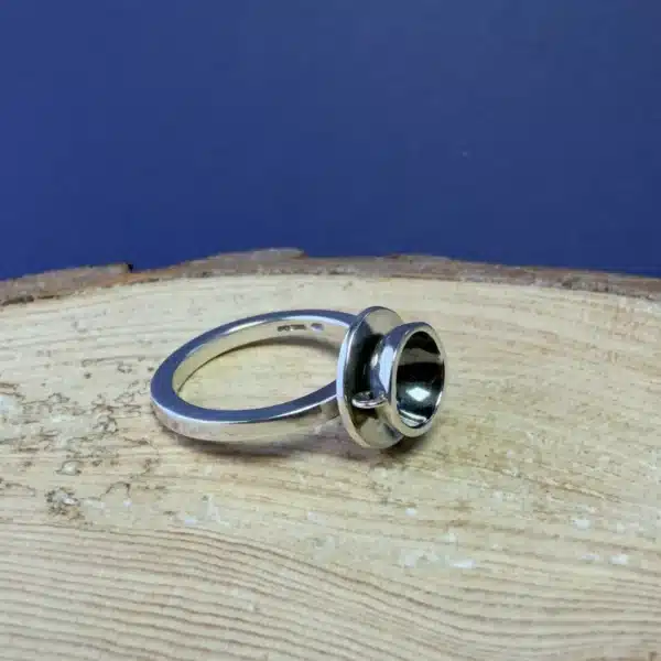 Purple Phoenix Jewellery-Silver teacup and saucer ring on wooden background