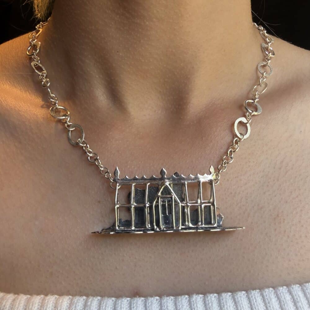 Silver Victorian Greenhouse necklace with my signature halo necklace as a connecting chain. Worn on a model