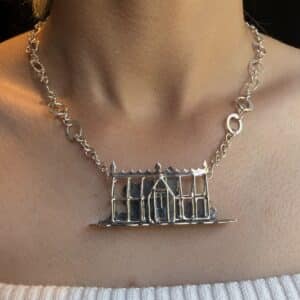 Silver Victorian Greenhouse necklace with my signature halo necklace as a connecting chain. Worn on a model