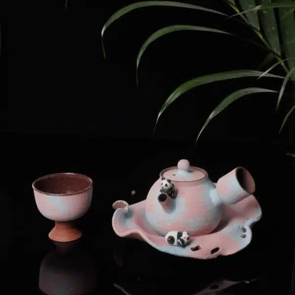 Close-up of handmade panda ceramic tea set in pink with sponge-painted glaze, unique gift idea, crafted in Jingdezhen, China, by Fatfinger Atelier