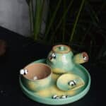 Close-up of a handmade panda ceramic tea set with sponge-painted glaze in pale green and yellow, featuring a soft marshmallow-like texture, Chinese pottery crafted in Jingdezhen by Fatfinger Atelier UK