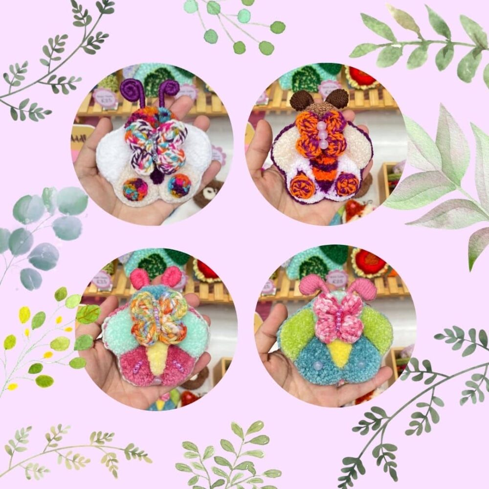 A square digital collage with a soft lavender background decorated with watercolour green leaves and vines. Arranged in a two-by-two grid are four circular photo windows, each showing a hand holding a highly detailed, palm-sized textile insect. The pieces are crafted using punch needle and crochet techniques, featuring a base layer of colorful wings and a smaller, highly texturized 3D butterfly stitched onto the centre. The designs are embellished with tiny glass beads and decorative yarn antennae, showcasing variations in white, magenta, orange, mint green, and sky blue.