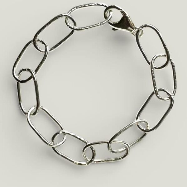 Easy to wear silver links with a hammer finish to catch the light. By Quite Contrary Jewellery