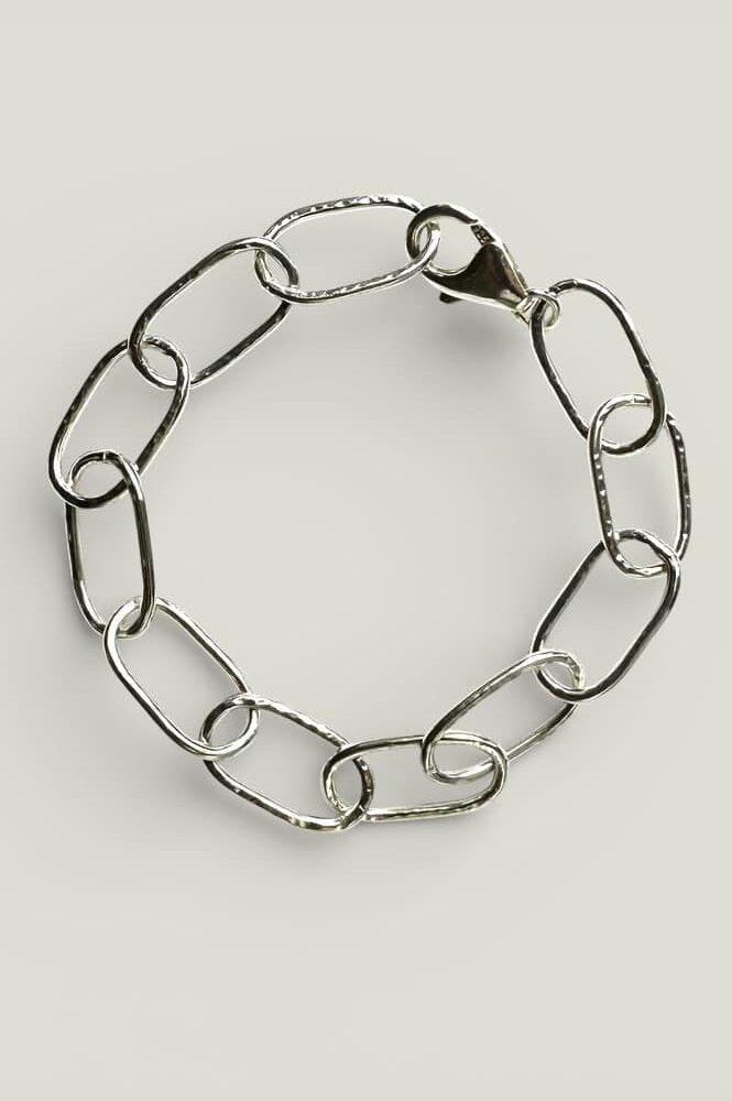 Easy to wear silver links with a hammer finish to catch the light. By Quite Contrary Jewellery