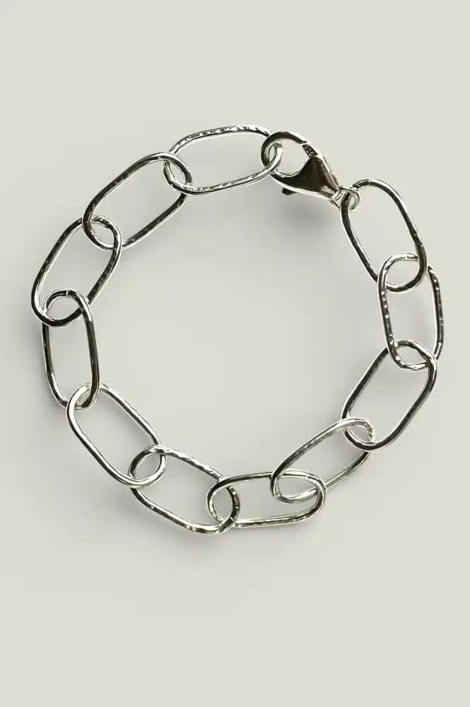 Easy to wear silver links with a hammer finish to catch the light. By Quite Contrary Jewellery